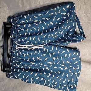 Mens Maamgic swim trunks, blue & white shark print, net inside